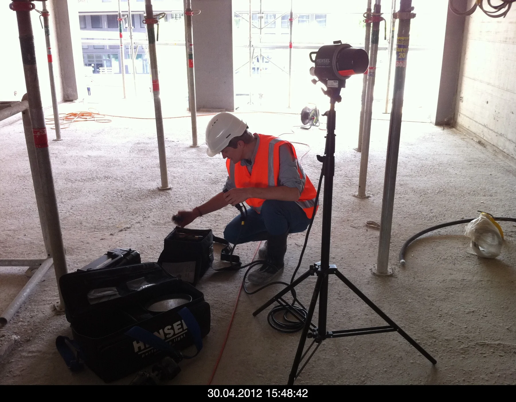 Work with recording equipment in an unfinished building
