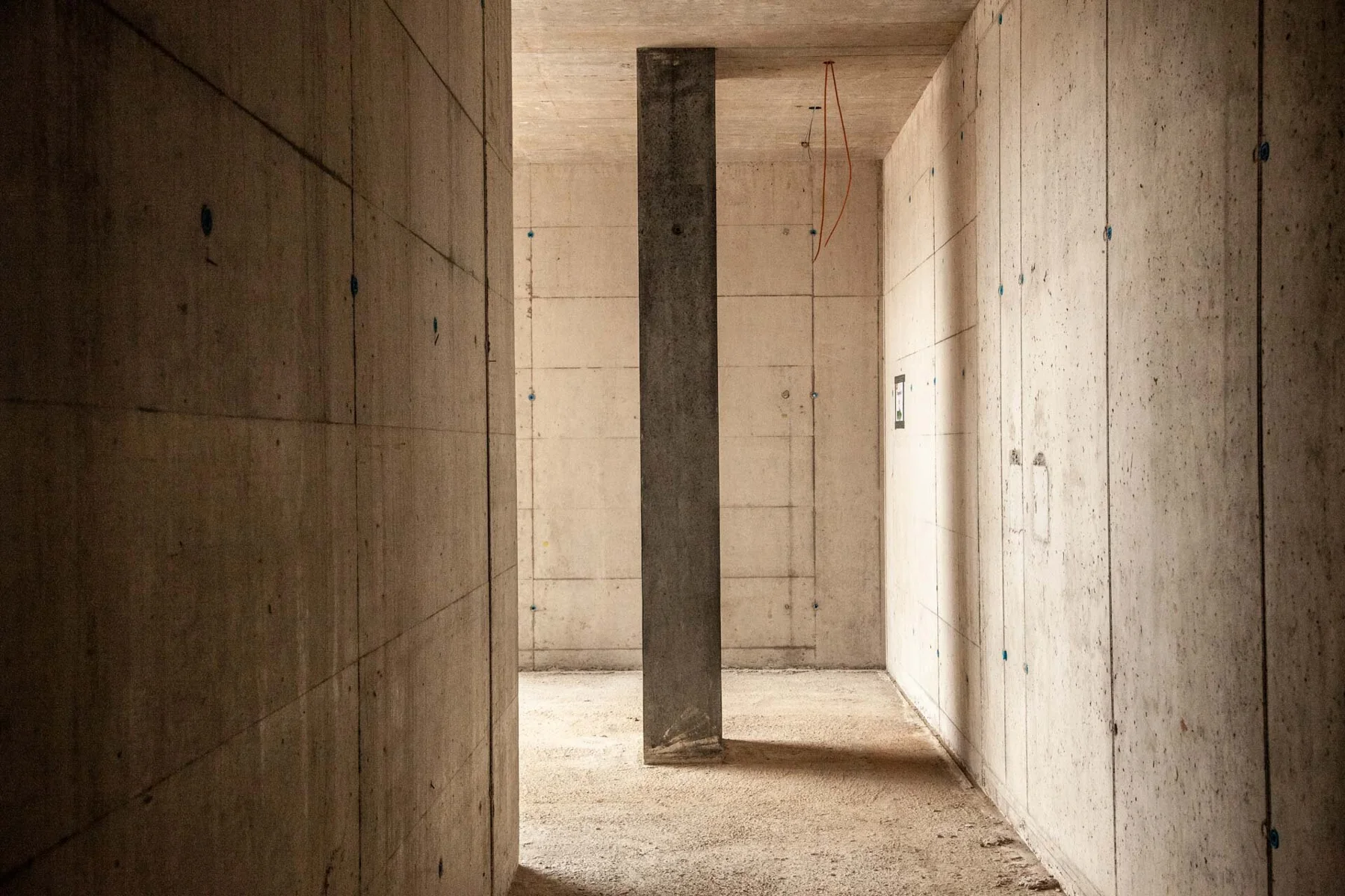 Concrete walls and passages in an unfinished building