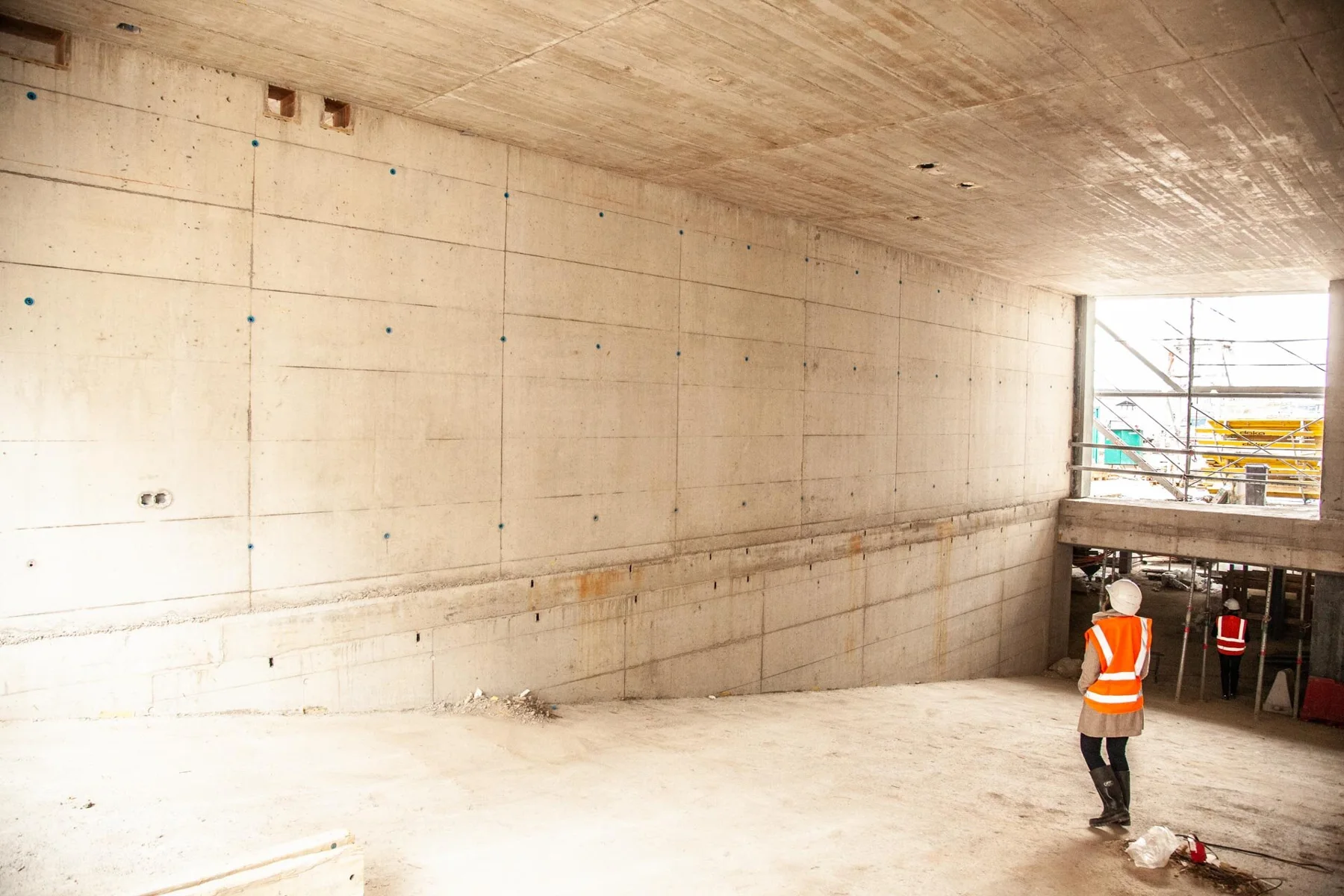 Concrete walls and passages in an unfinished building