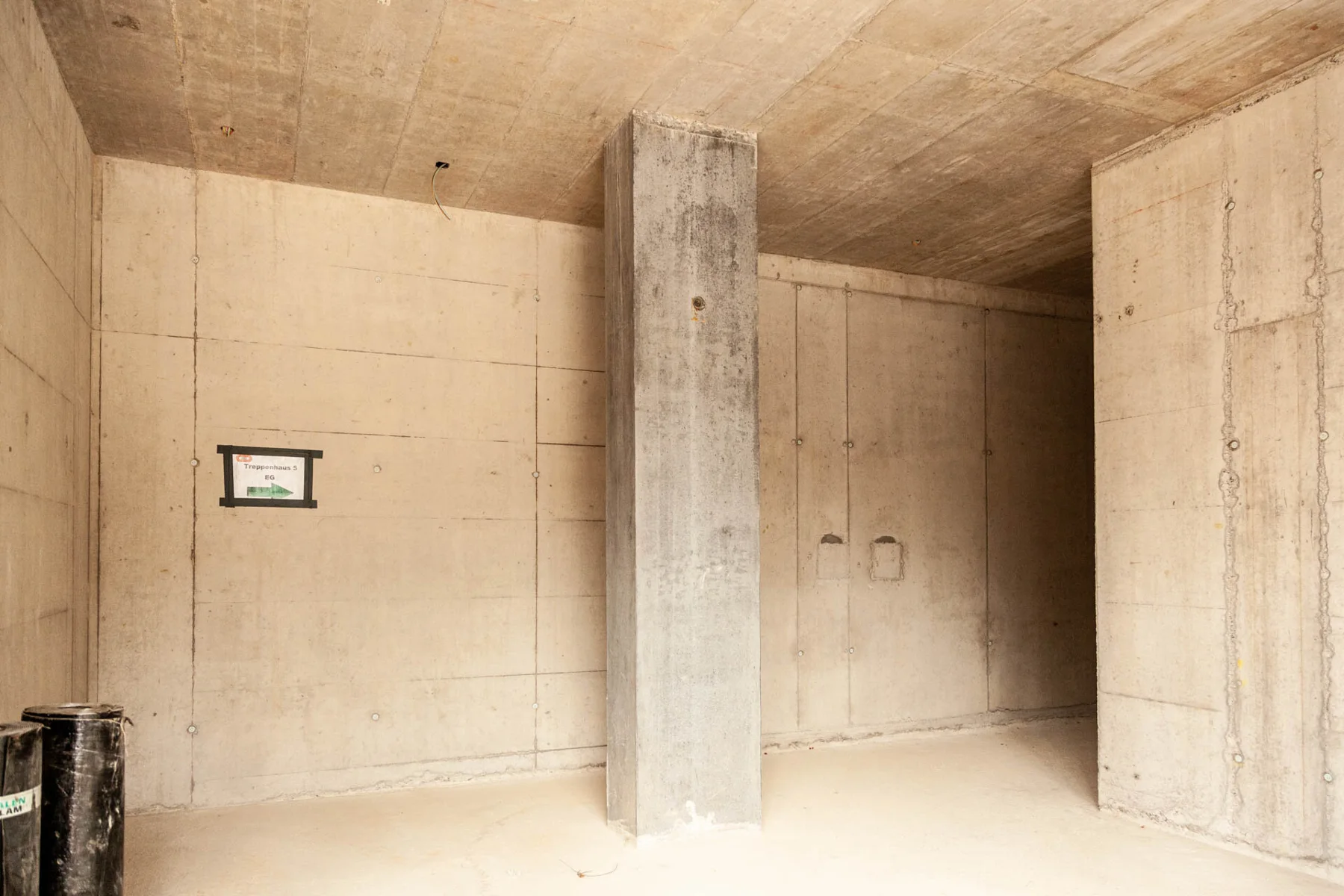 Concrete walls and passages in an unfinished building