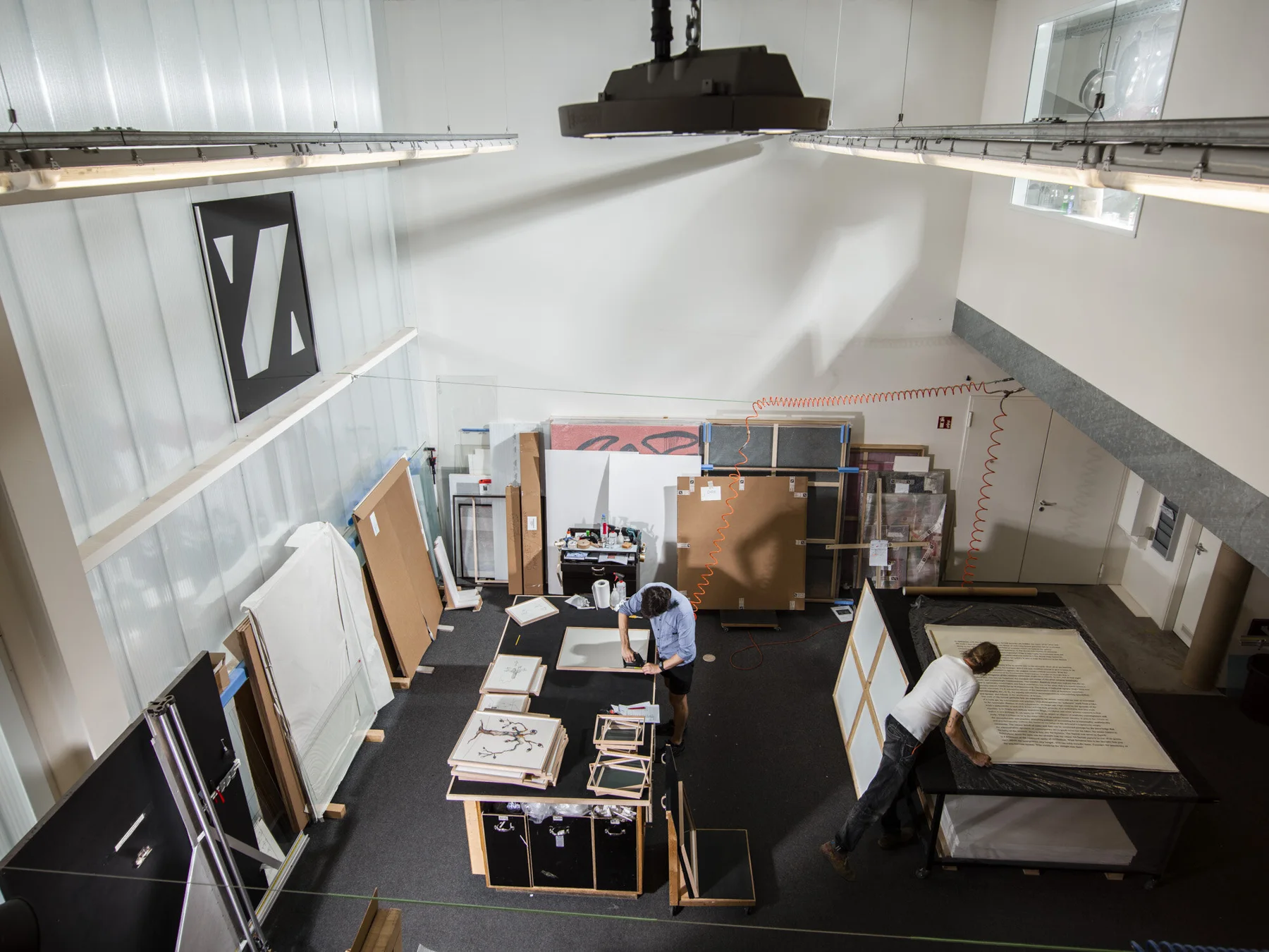 View into a studio with work surfaces and seating