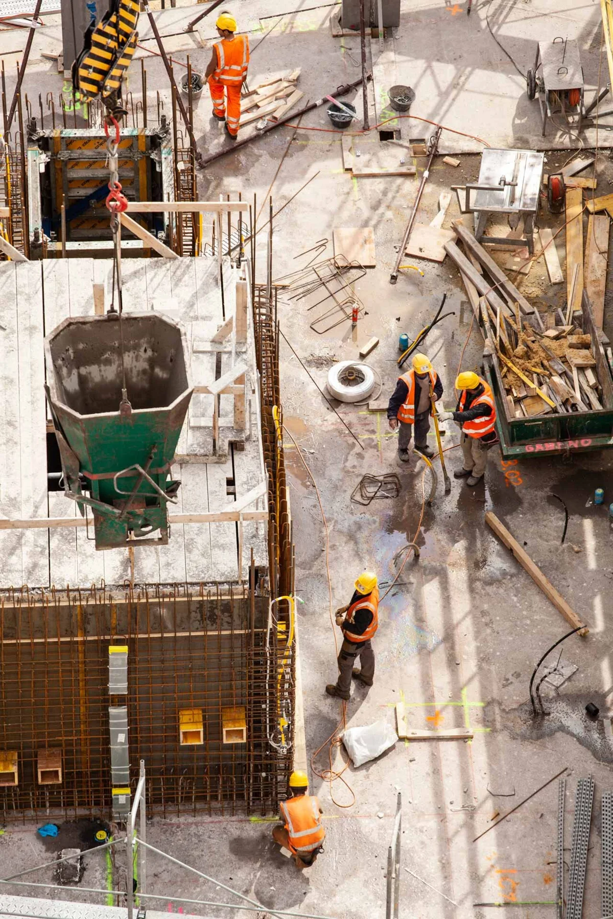 Overhead view of a building site with machinery and workers