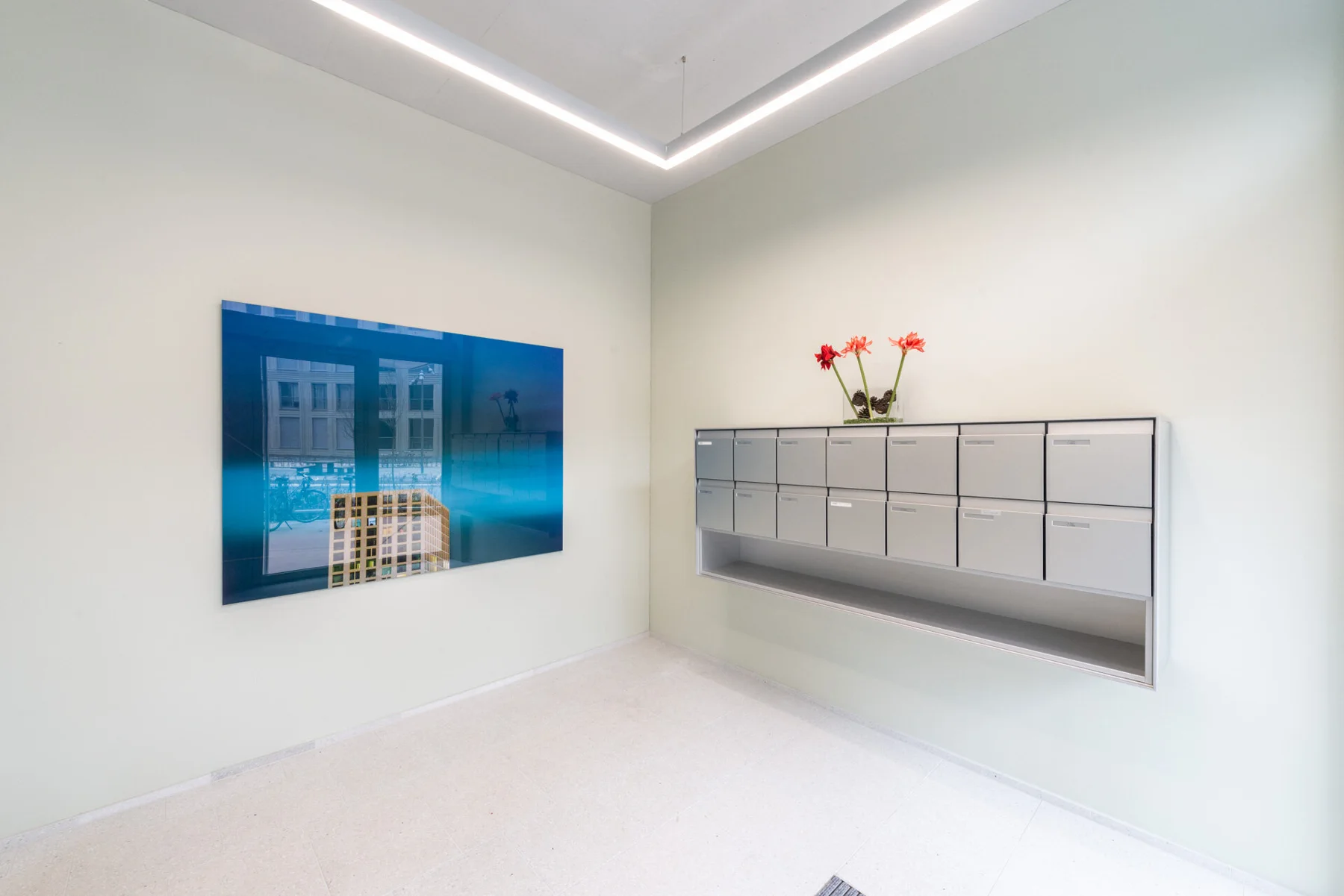 Photographic art with architecture and a blue sky in an entrance hall