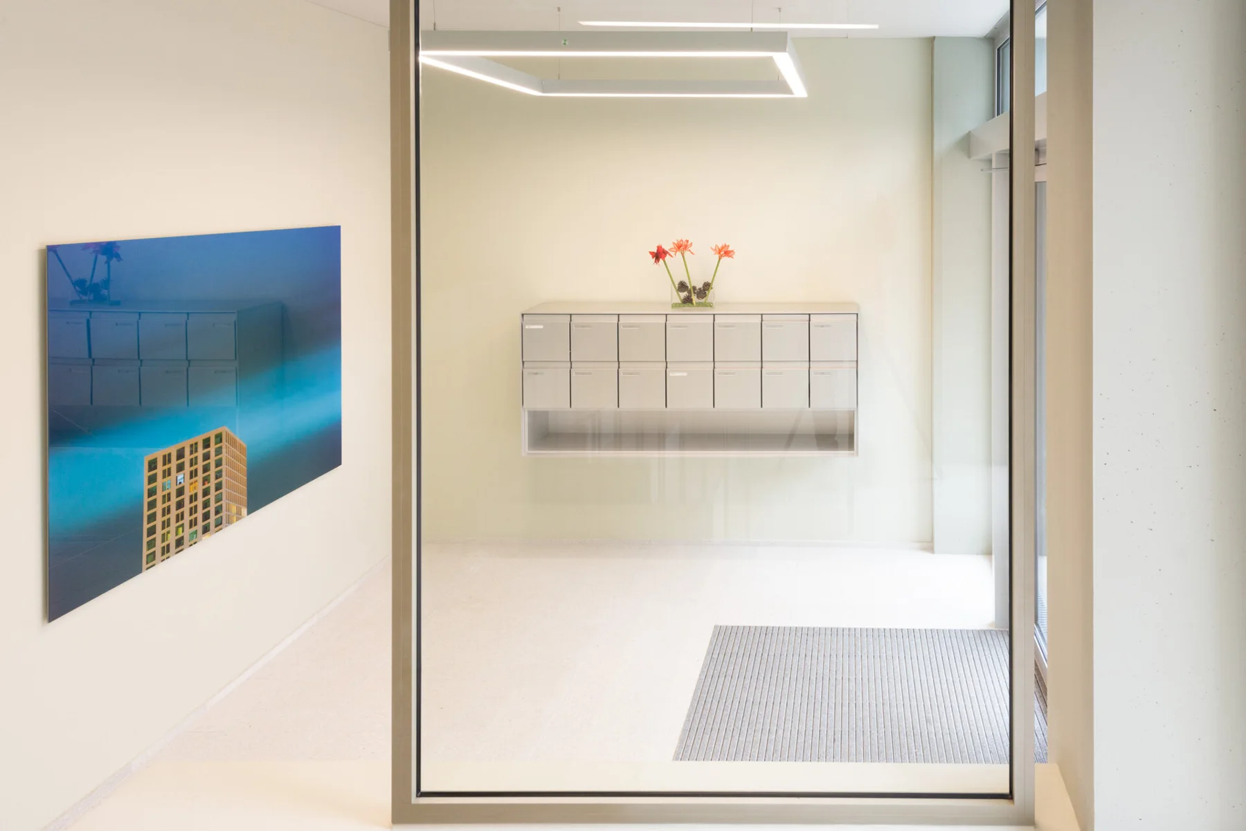 Photographic art with architecture and a blue sky in an entrance hall