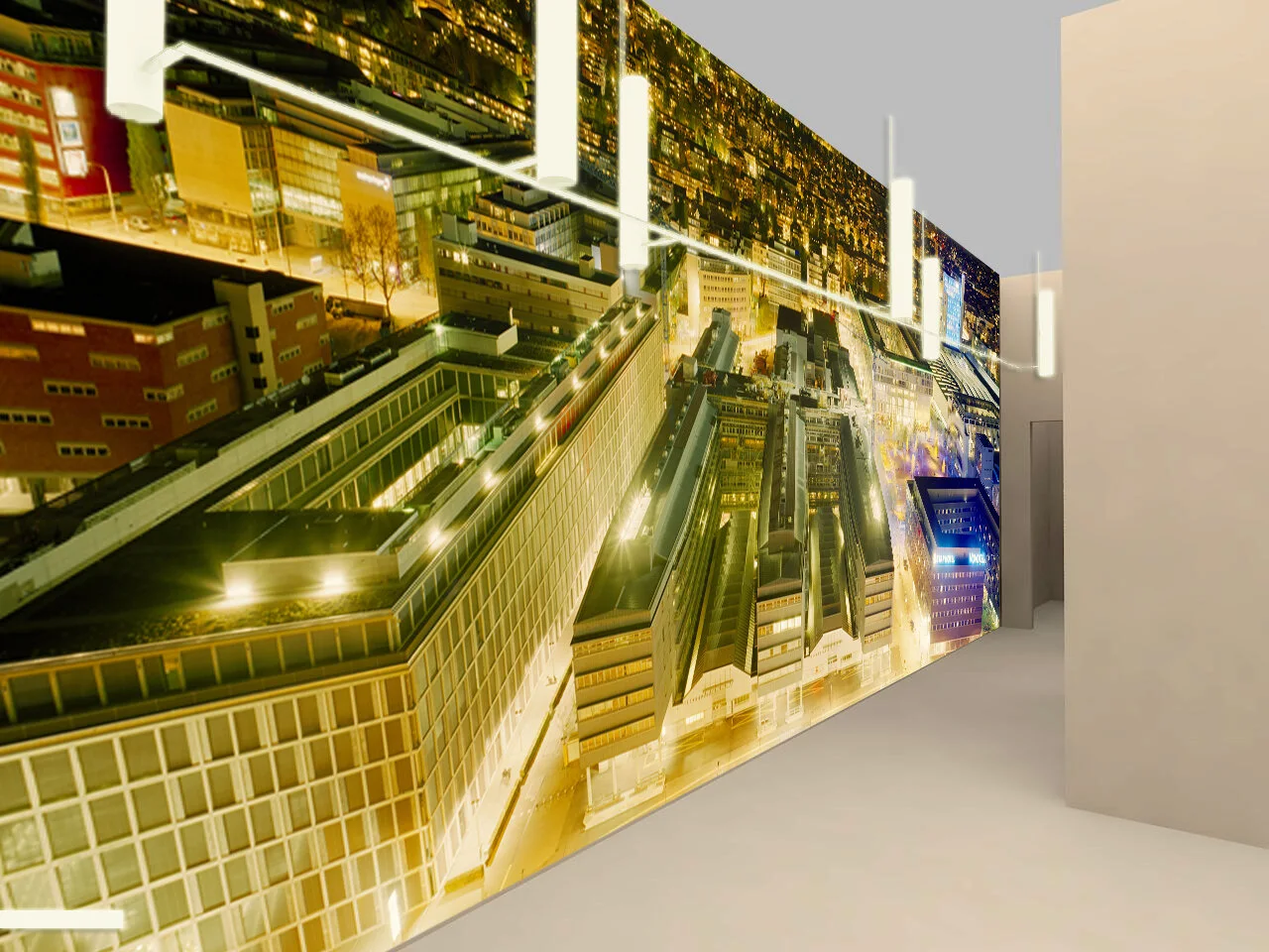 Large urban photographic artwork with roads and light trails in an entrance hall