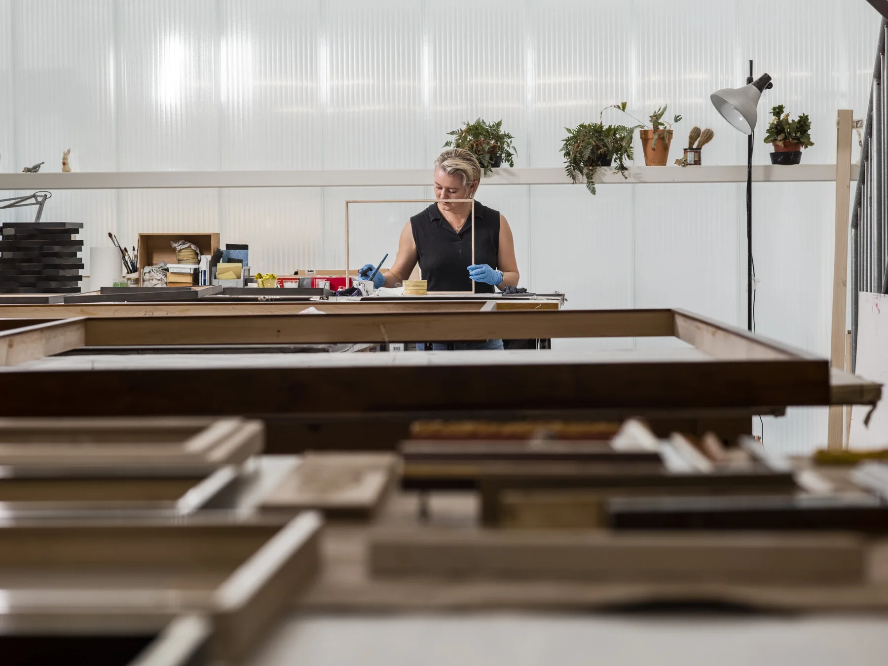 Handcrafted picture frames being made in a workshop