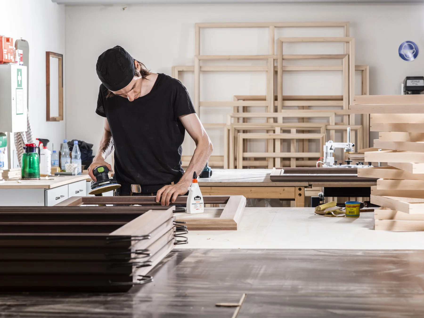 Handcrafted picture frames being made in a workshop