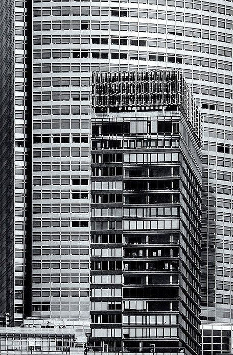 Fine art photography by André Wagner: Several high-rise facades overlap in black and white — New York Silver Edition 1.