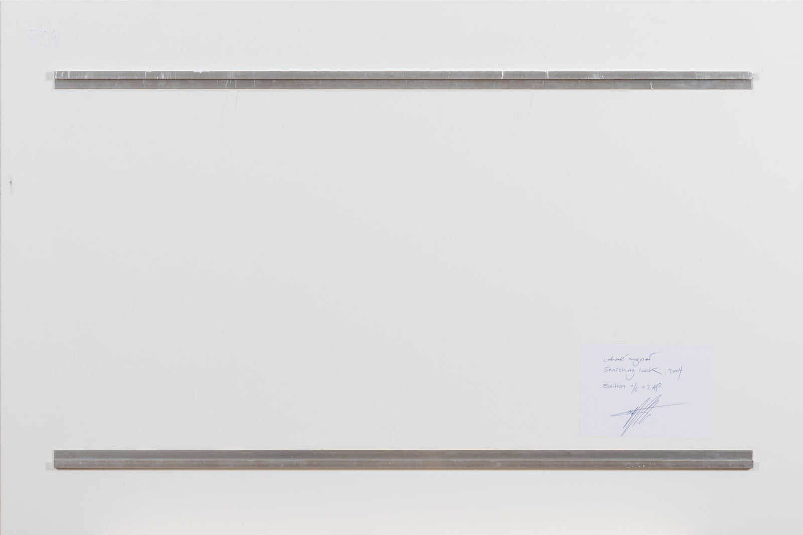 Vue du dos de l’œuvre photographique « Searching look, Spanien » d’André Wagner.