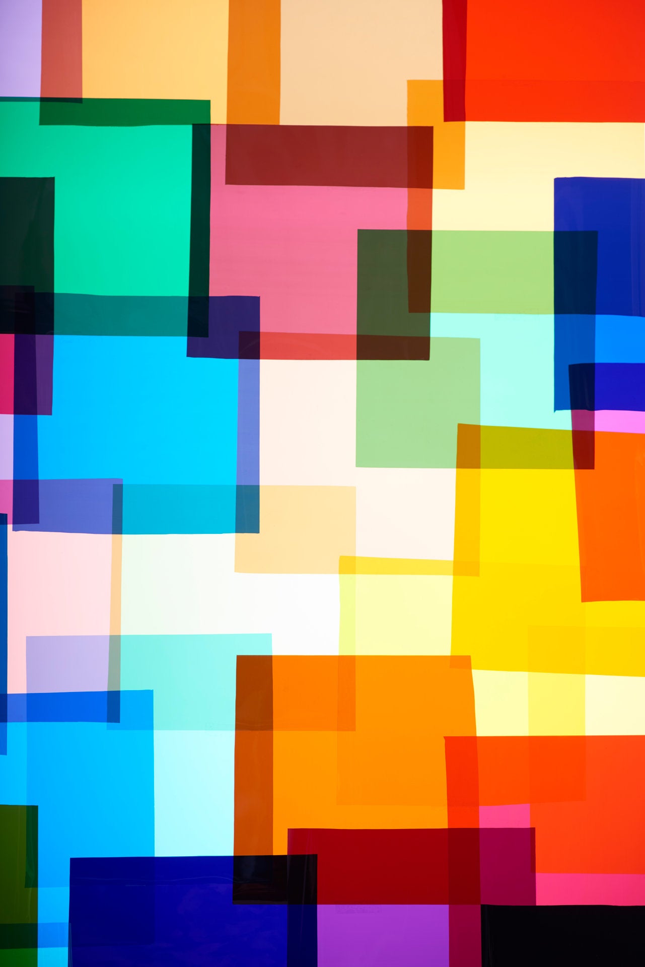 Photographie d’art d’André Wagner: Des rectangles rouges, jaunes, verts et bleus se superposent sur une surface claire — Without Paula.