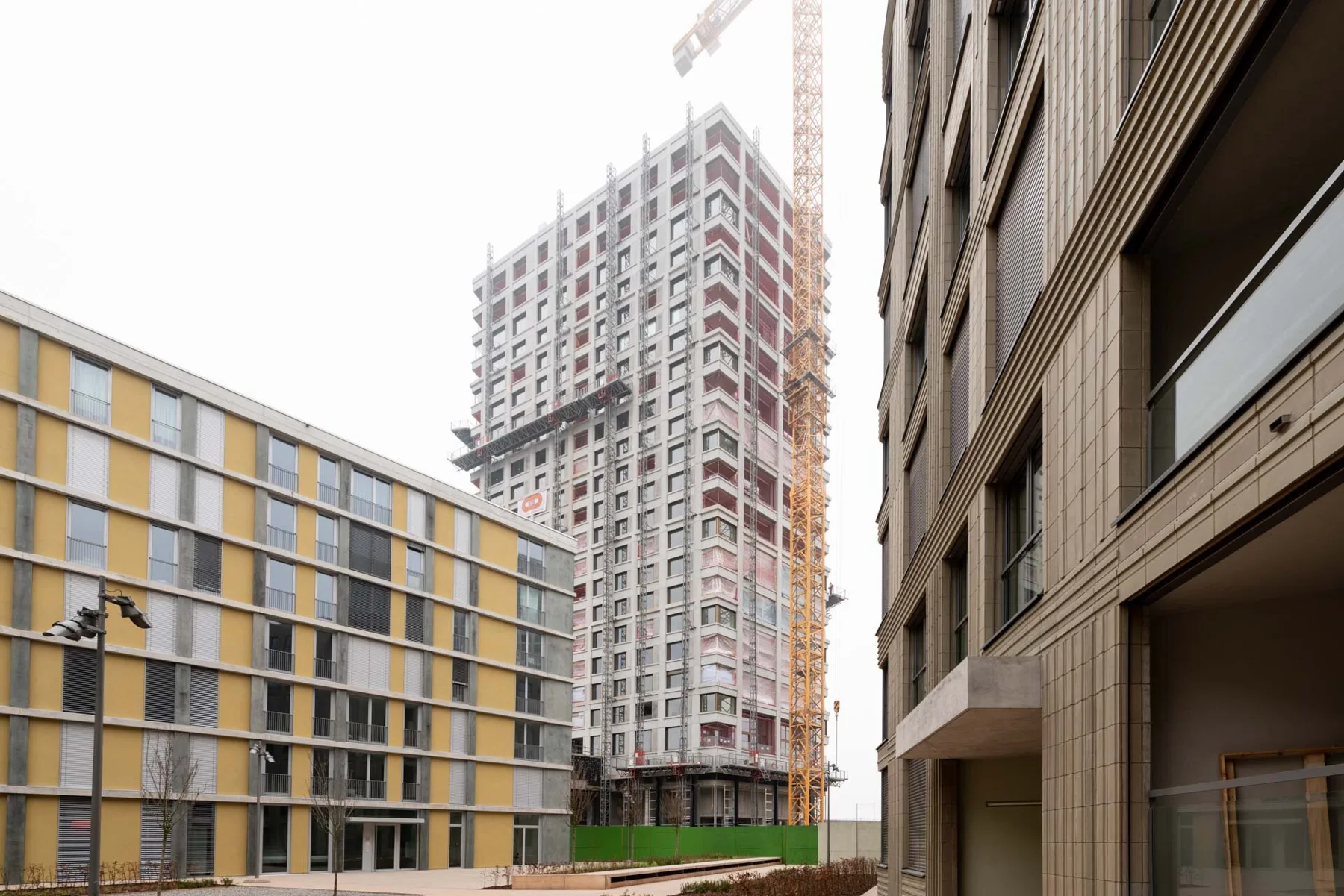 Residential buildings and paths between multi-storey facades