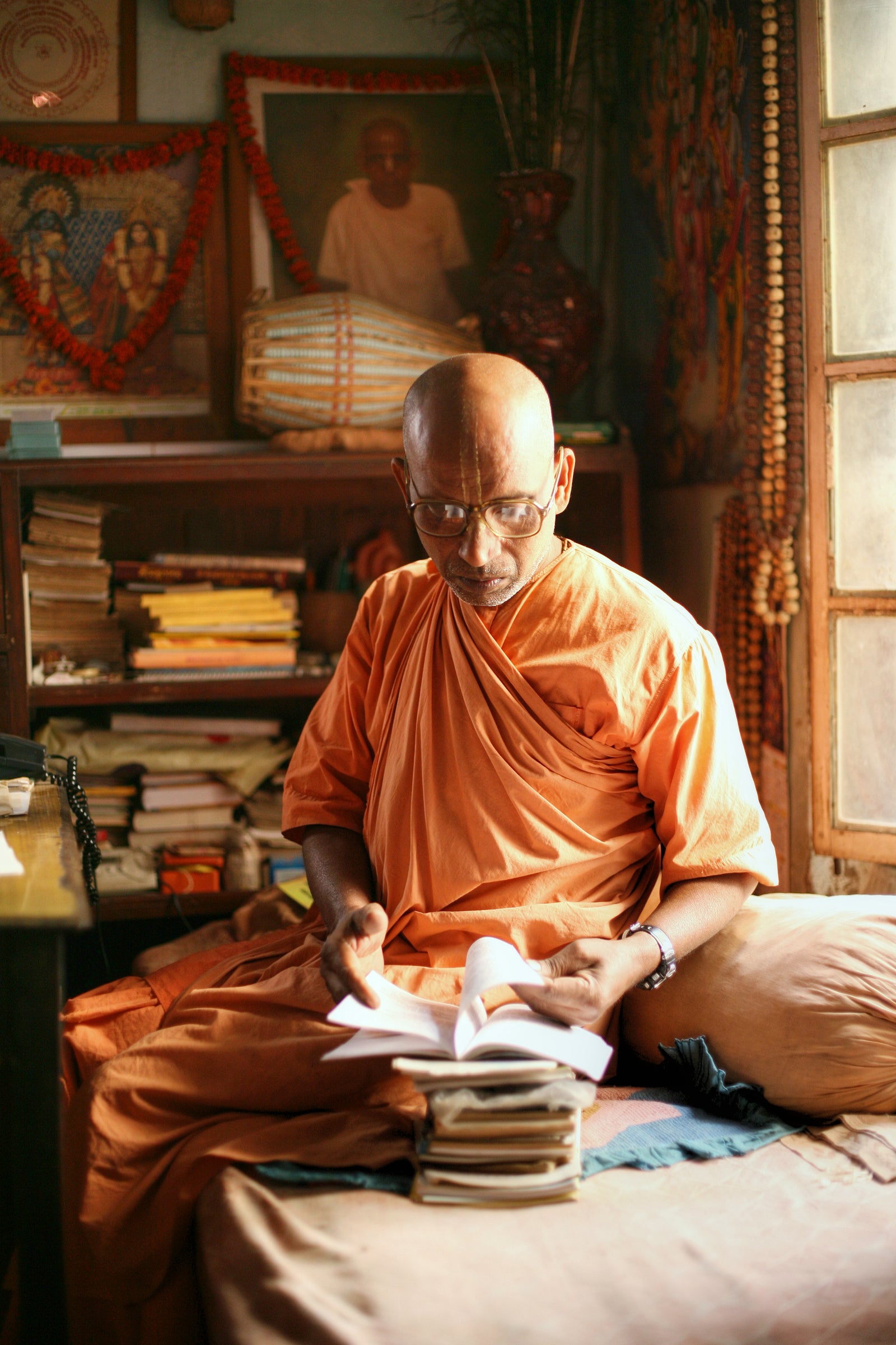 Monk reading Vedic texts, Mayapur, West Bengal